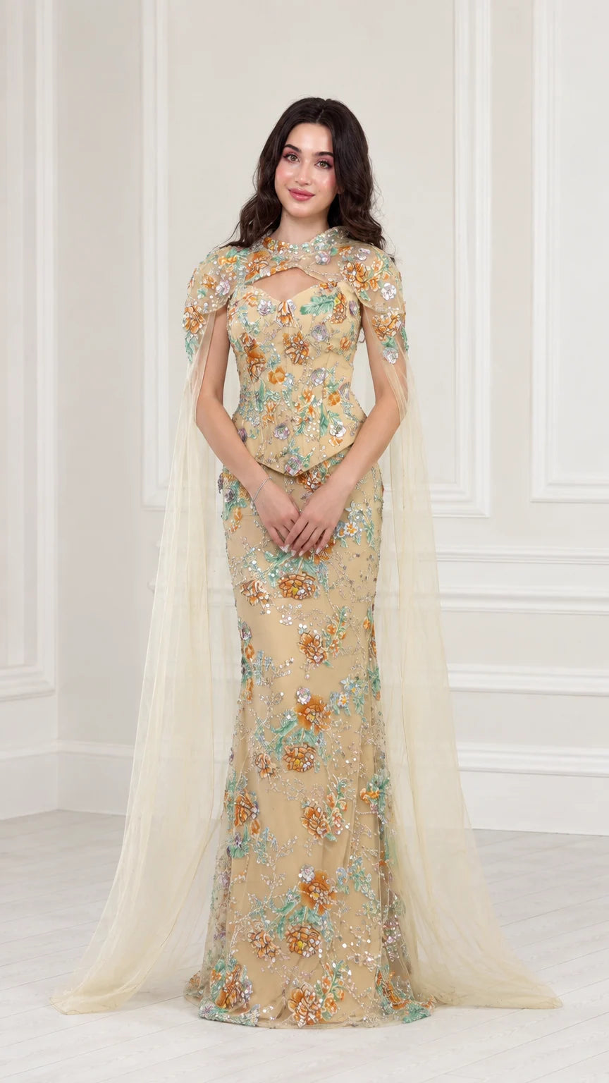 Front full view of Champagne floral embroidered evening gown with attached floor-length cape