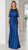 Front full view of woman wearing royal blue satin evening gown with flutter overlay
