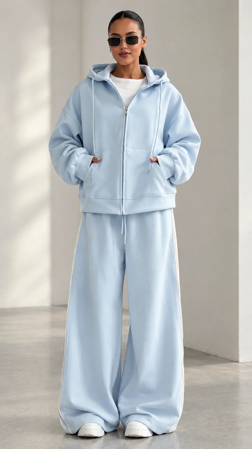 Full front view of model wearing Light Blue oversized zip hoodie and wide-leg sweatpants set