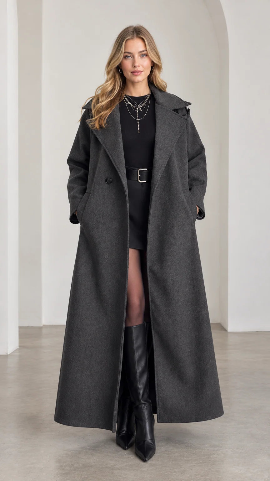 Front view of model wearing full-length Charcoal Grey maxi belted overcoat