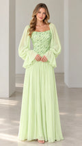 Front full-length view of mint green sequin bodice evening dress with long flounce sleeves