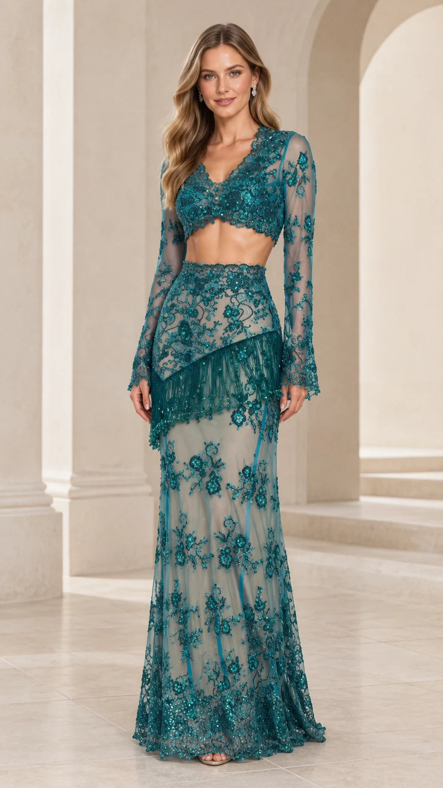 Front view of model wearing Teal two-piece sequin lace evening gown with long sleeves and beaded fringe skirt