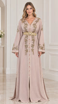 Front view of woman wearing Dusty Pink Moroccan embroidered kaftan maxi dress with gold belt