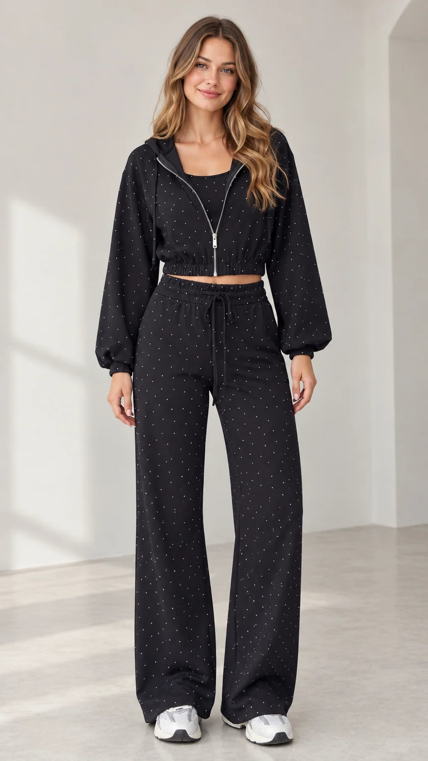 Full front view of model wearing black rhinestone cropped zip hoodie and wide-leg pants set