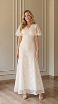 Front view of Ivory lace maxi dress on model