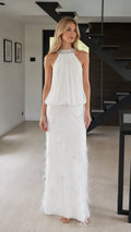 Front view of white embellished halter pleated maxi dress