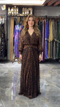 Front view of bronze black sequin embroidered V-neck lantern sleeve maxi evening gown