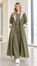 Full front view of women wearing olive green contrast lapel maxi duster trench coat with matching trousers