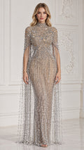 Front view of Champagne Silver high neck beaded evening gown with long fringe cape sleeves on model