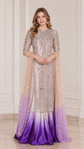 Front full-length view of champagne and purple ombre embroidered tunic skirt set