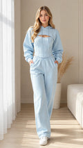 Front full-length view of woman wearing Light Blue 3-piece corset hoodie and sweatpants set