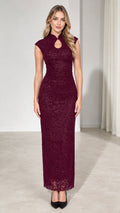 Front view of woman wearing burgundy sequin lace high neck maxi dress