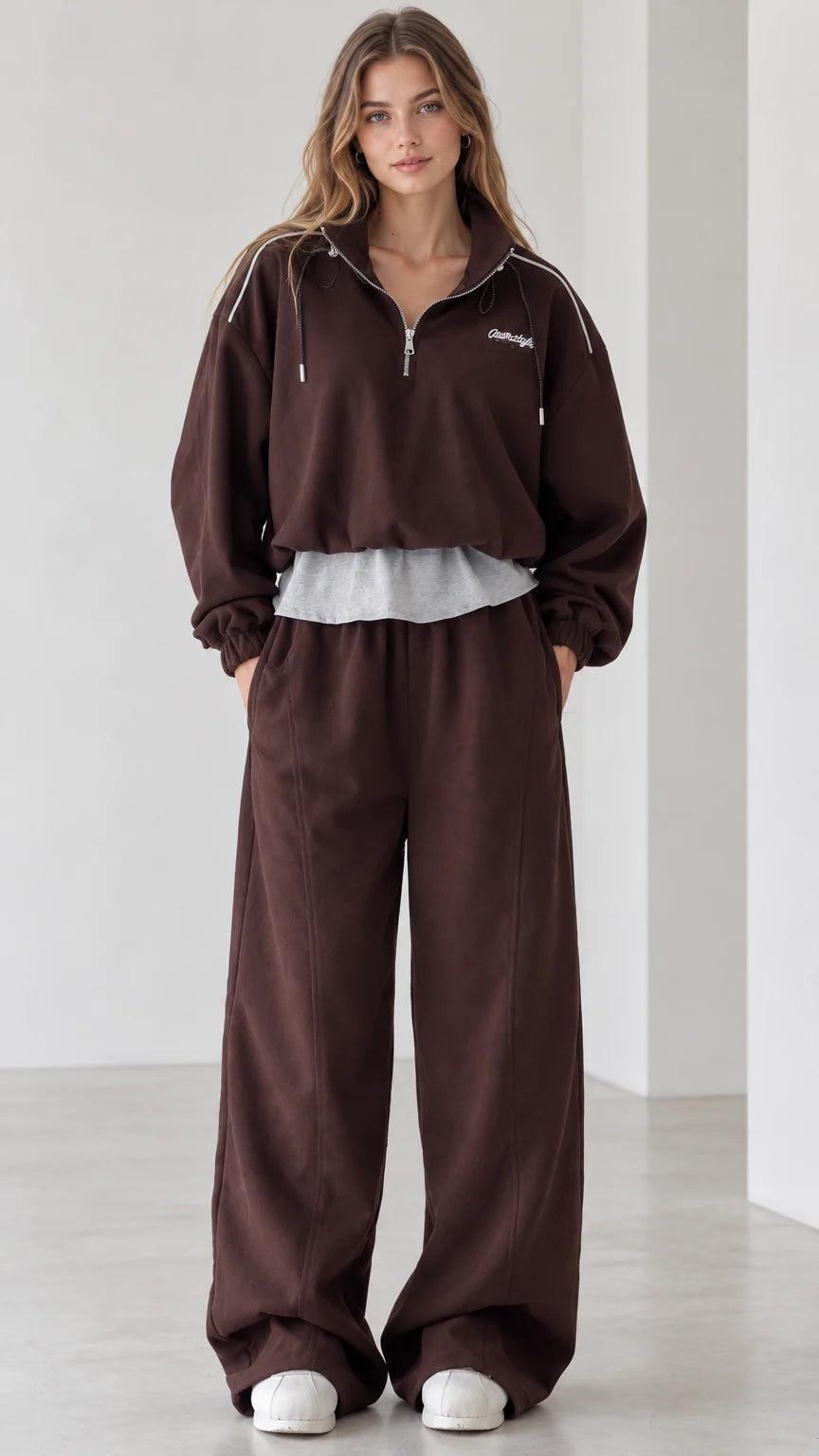 Front full view of women's chocolate brown half-zip layered pullover and wide-leg tracksuit set