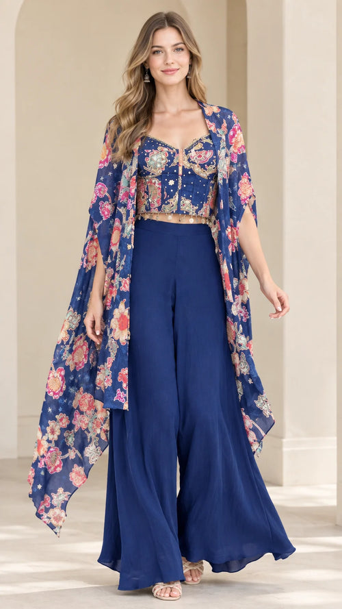 Front full-length view of royal blue 3-piece floral cape top and palazzo pants set