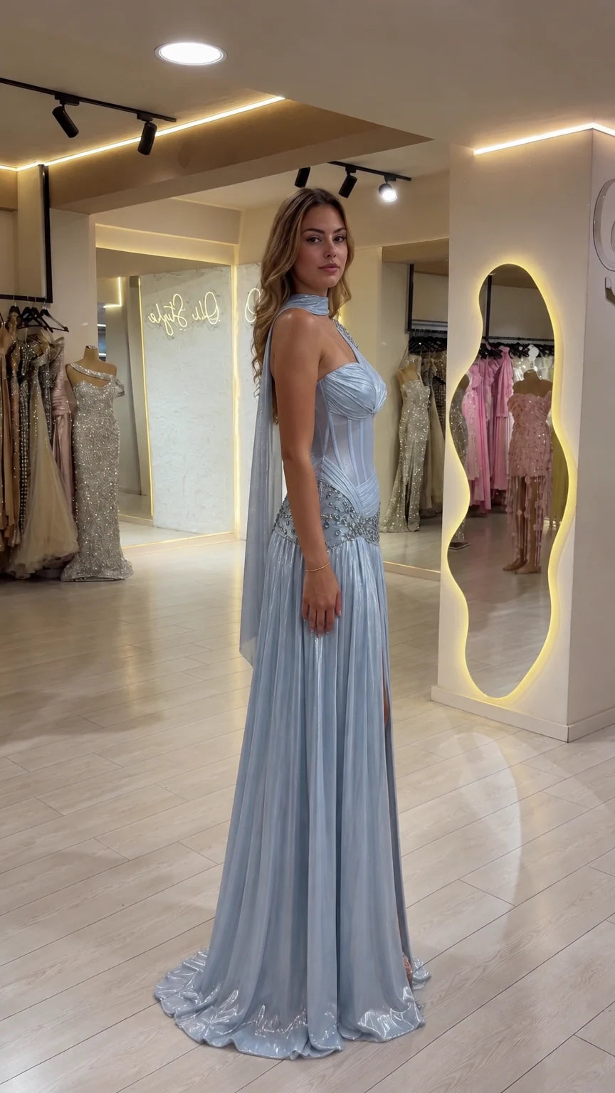 Side profile view of woman wearing Ice Blue metallic shimmer formal gown