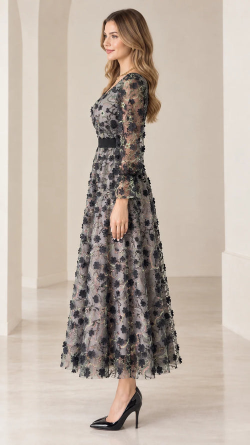 Side profile view of gray floral sequin A-line midi dress