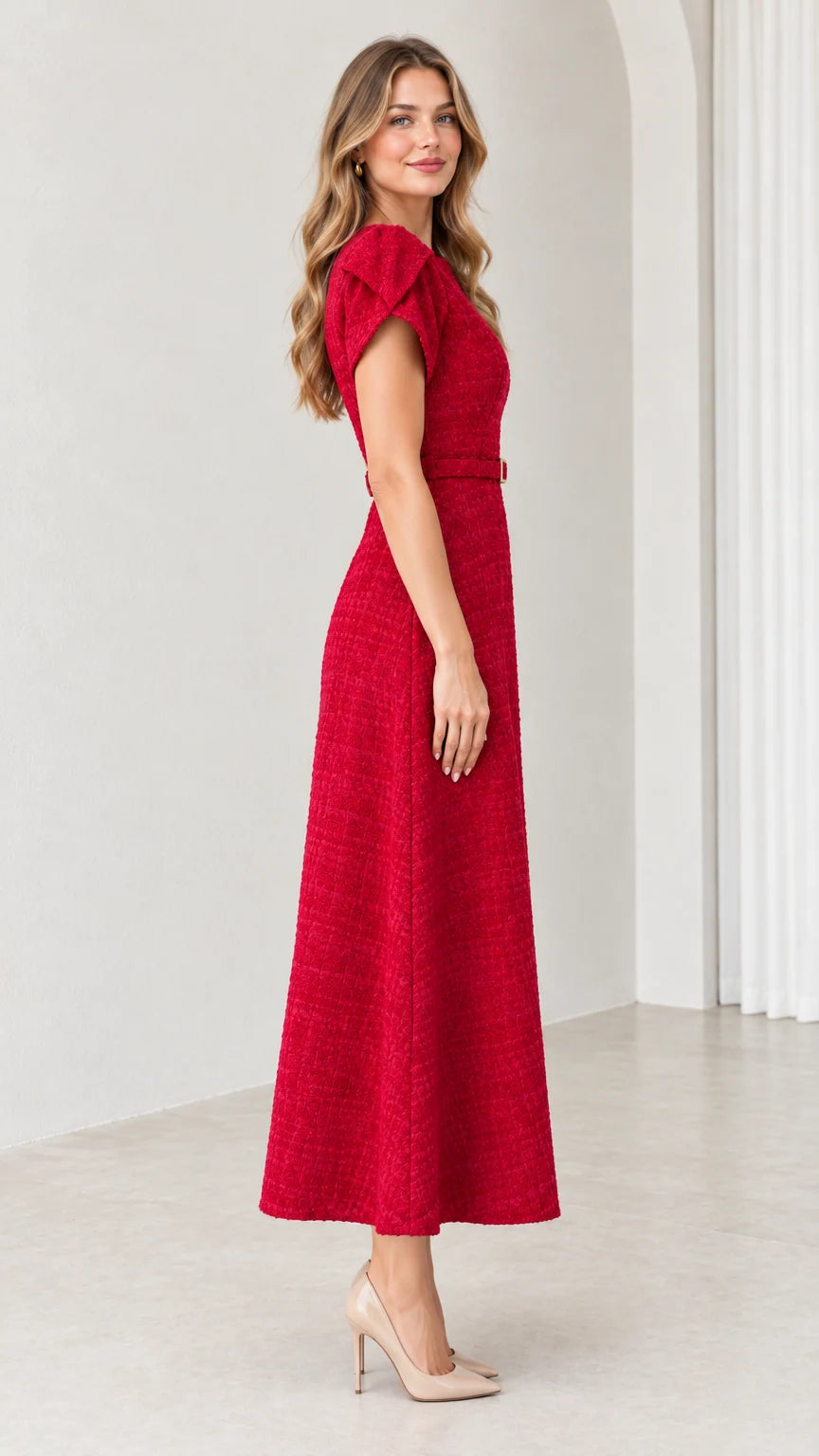 Side profile view of woman wearing red short-sleeve tweed midi dress