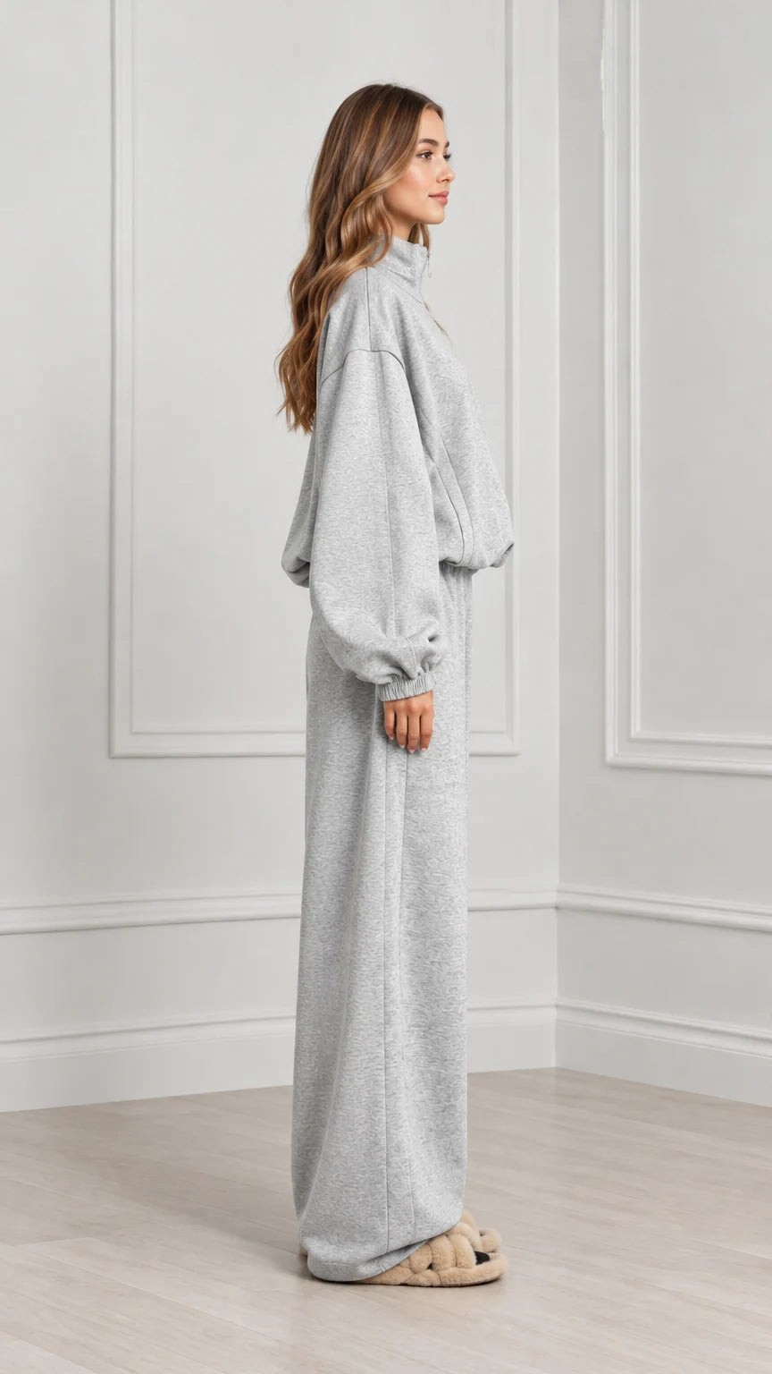 Side profile of women's heather grey matching sweatpants set