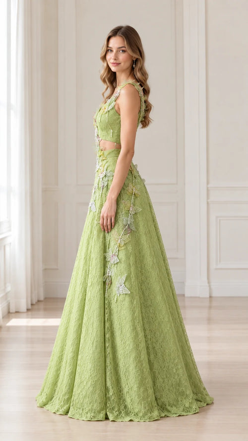 Side profile of woman in Sage Green lace cutout maxi dress with butterfly appliqués