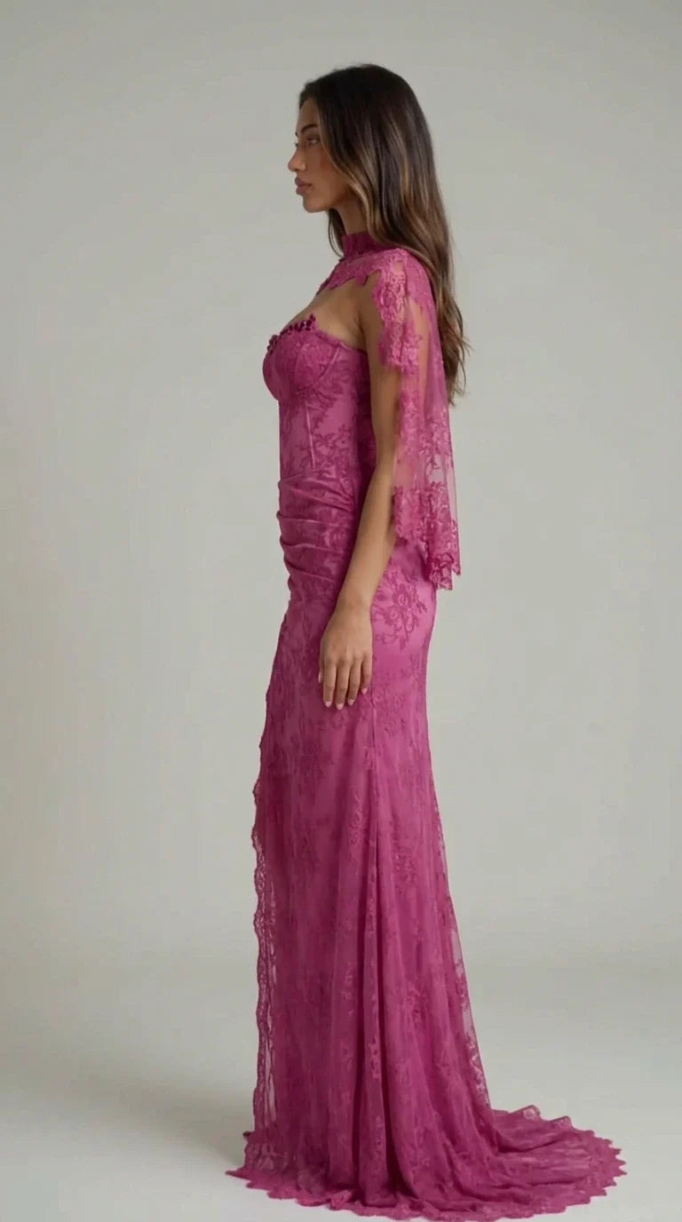 Side profile view of magenta lace maxi gown showing ruched hip detail and sweep train