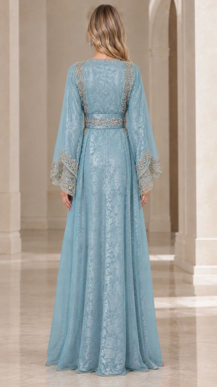 Back view of dusty blue embroidered floor-length kaftan dress