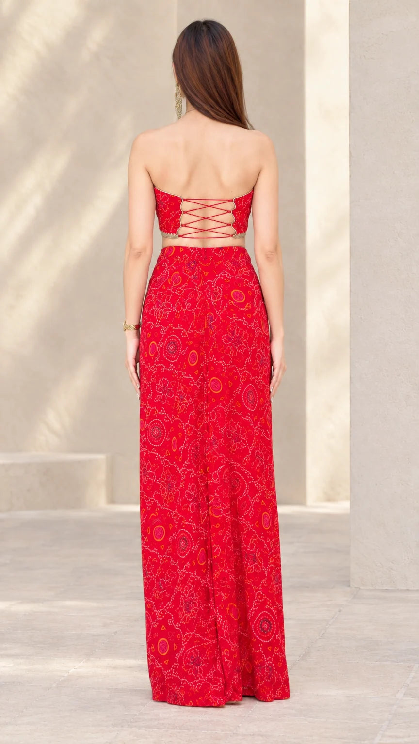 Back view of Red strapless crop top showing criss-cross lace-up tie details