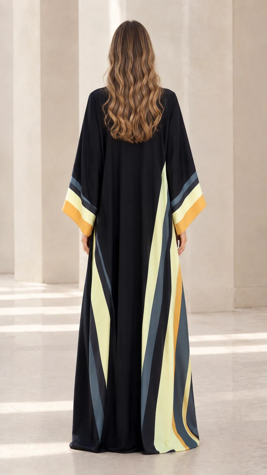 Back view of black maxi kimono duster with vertical geometric colorblock panels