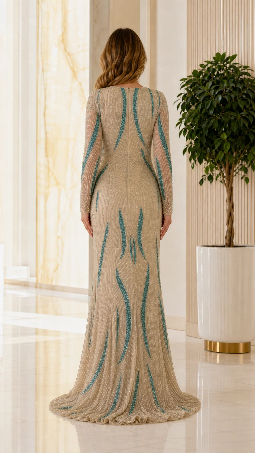 Back view of champagne evening gown with sweep train