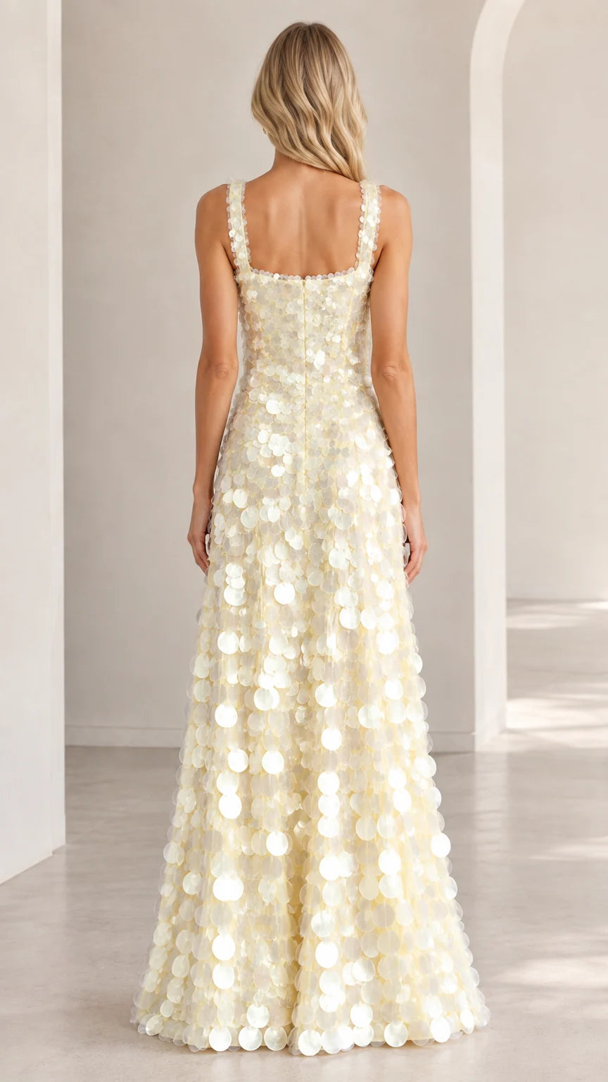 Back view of model wearing ivory square back paillette sequin maxi dress