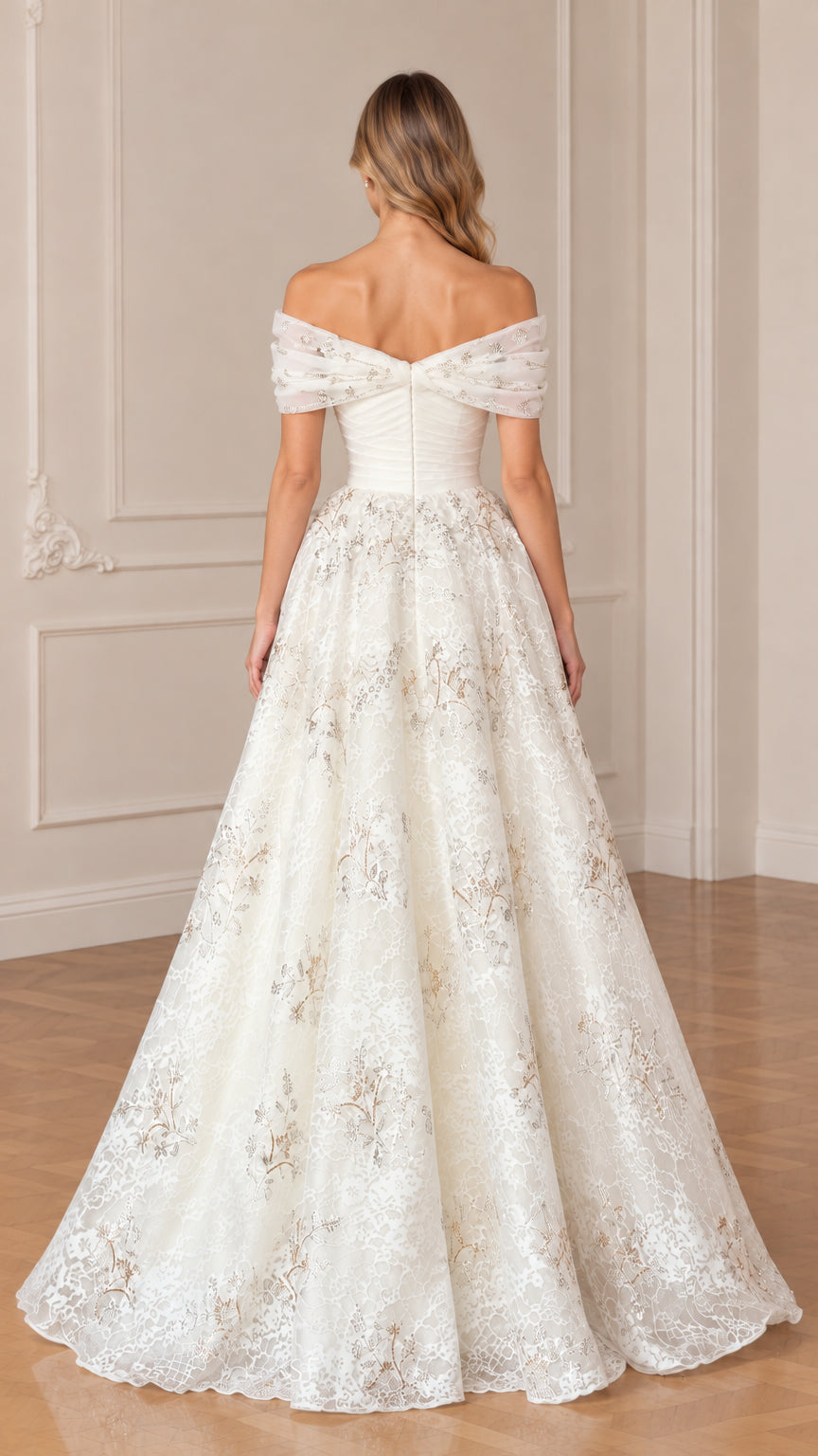 Back view of model showing off-the-shoulder back detail on ivory gown