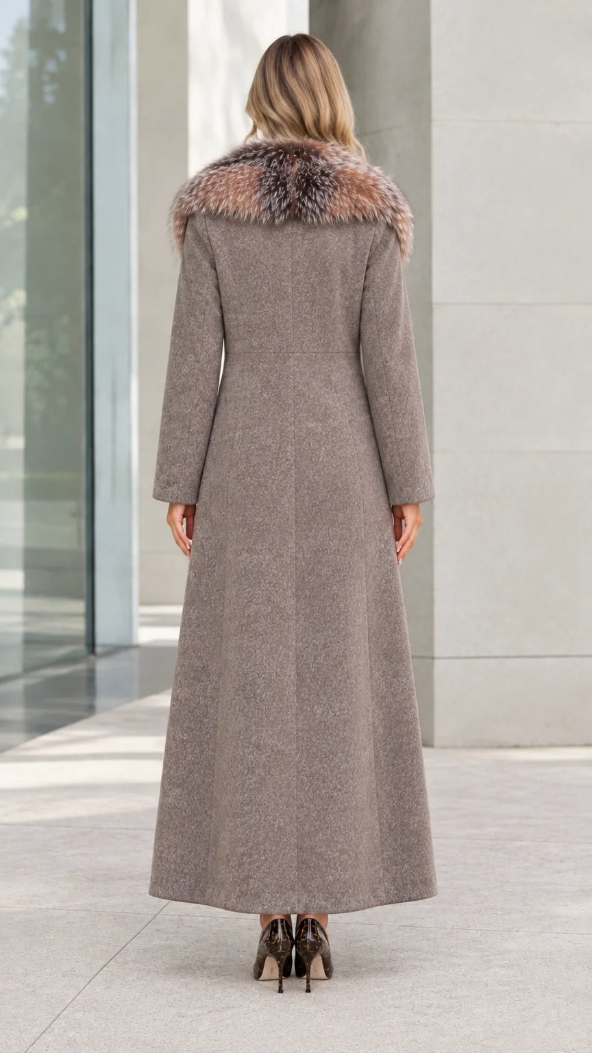 Back view of women's taupe structured maxi coat showing tailored fit and long hem