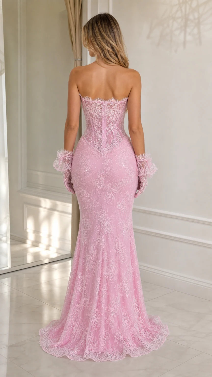 Back view of pink strapless lace mermaid gown