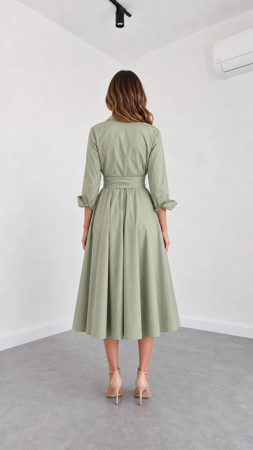 Back view of model wearing Sage Green midi shirt dress