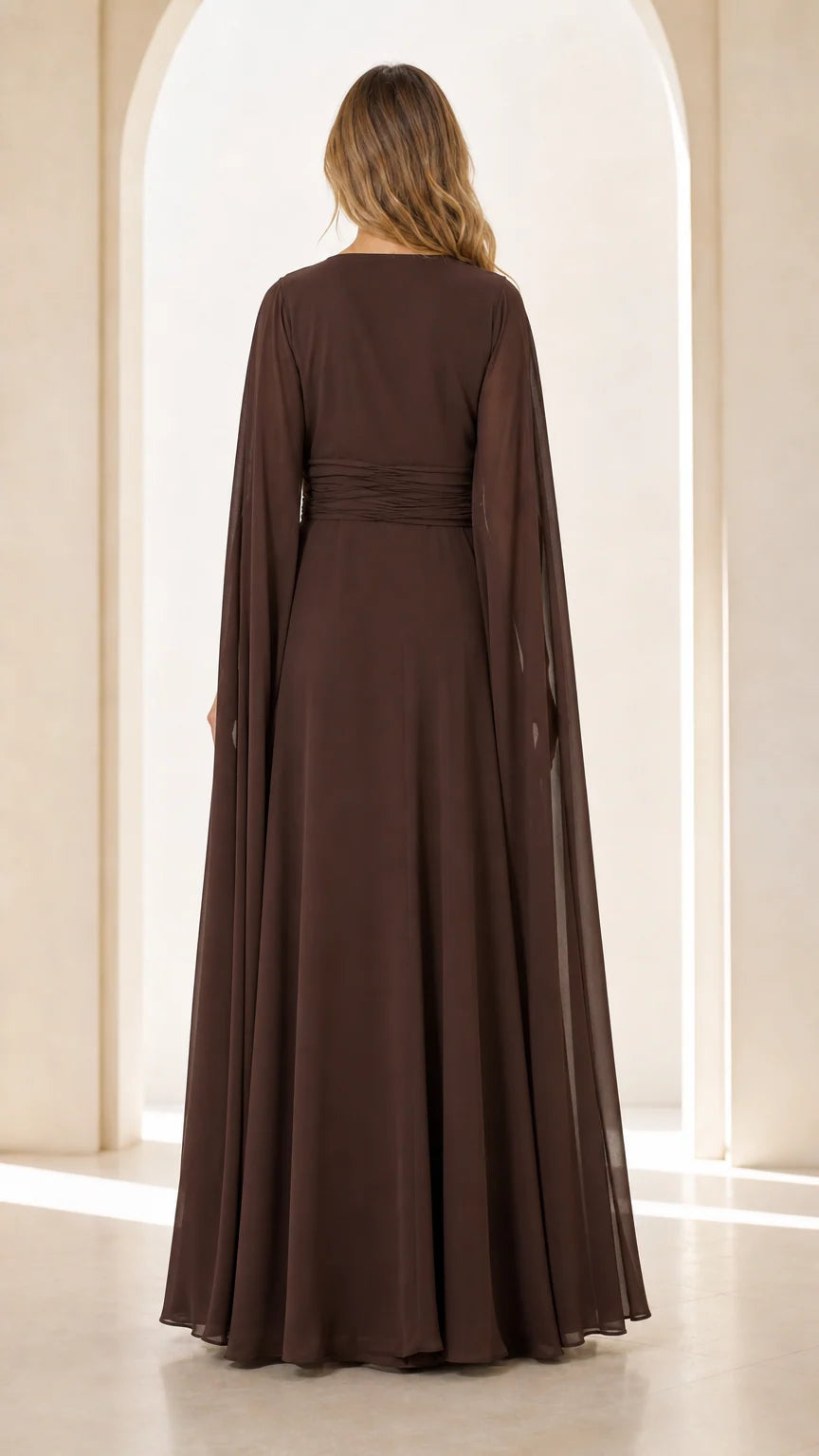 Back view of model wearing Chocolate Brown cape sleeve maxi gown
