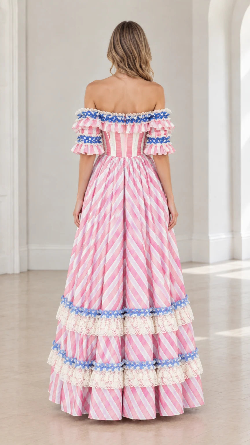 Back view of model in striped tiered Victorian ball gown dress