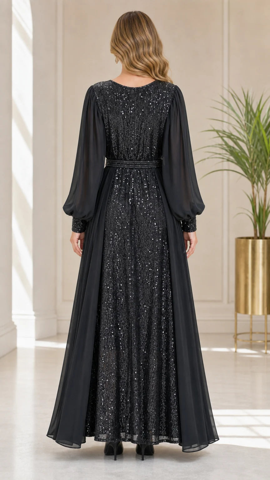 Back view of model wearing black sequin long sleeve evening dress