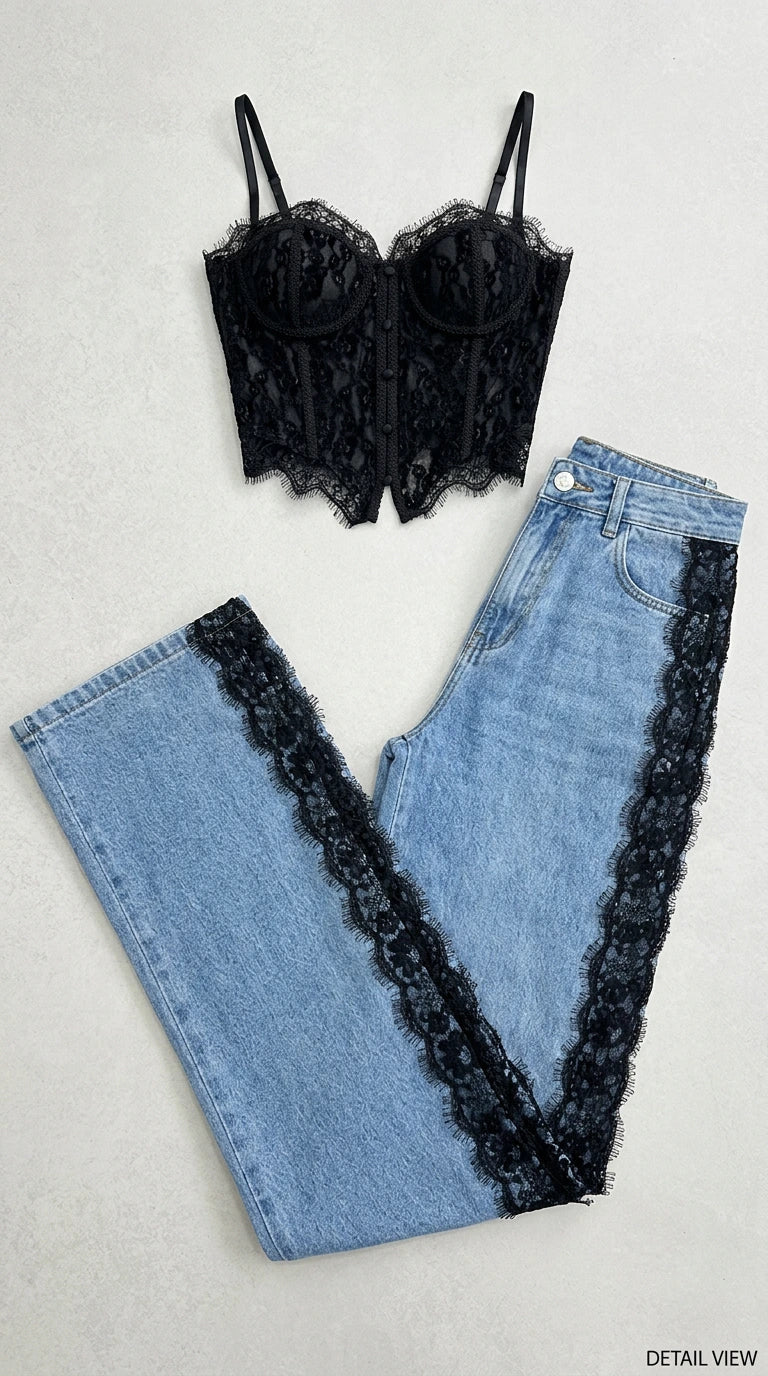 Flat lay view of black lace corset top and denim pants with lace panel detailing