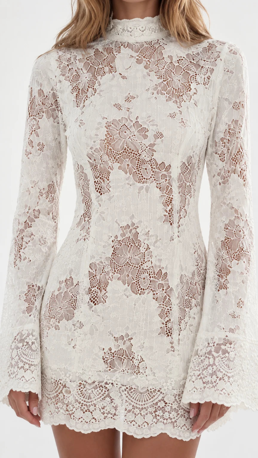Close-up detail of textured floral lace fabric on high neck dress