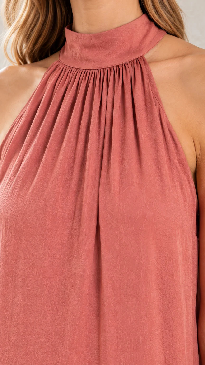 Close-up of gathered high halter neckline in Dusty Rose fabric