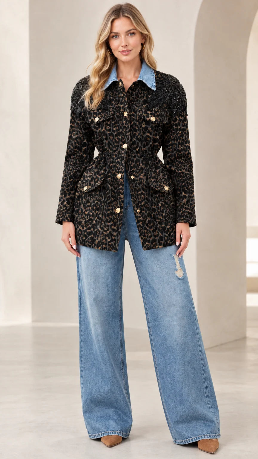Model wearing black leopard print utility jacket with contrast denim collar