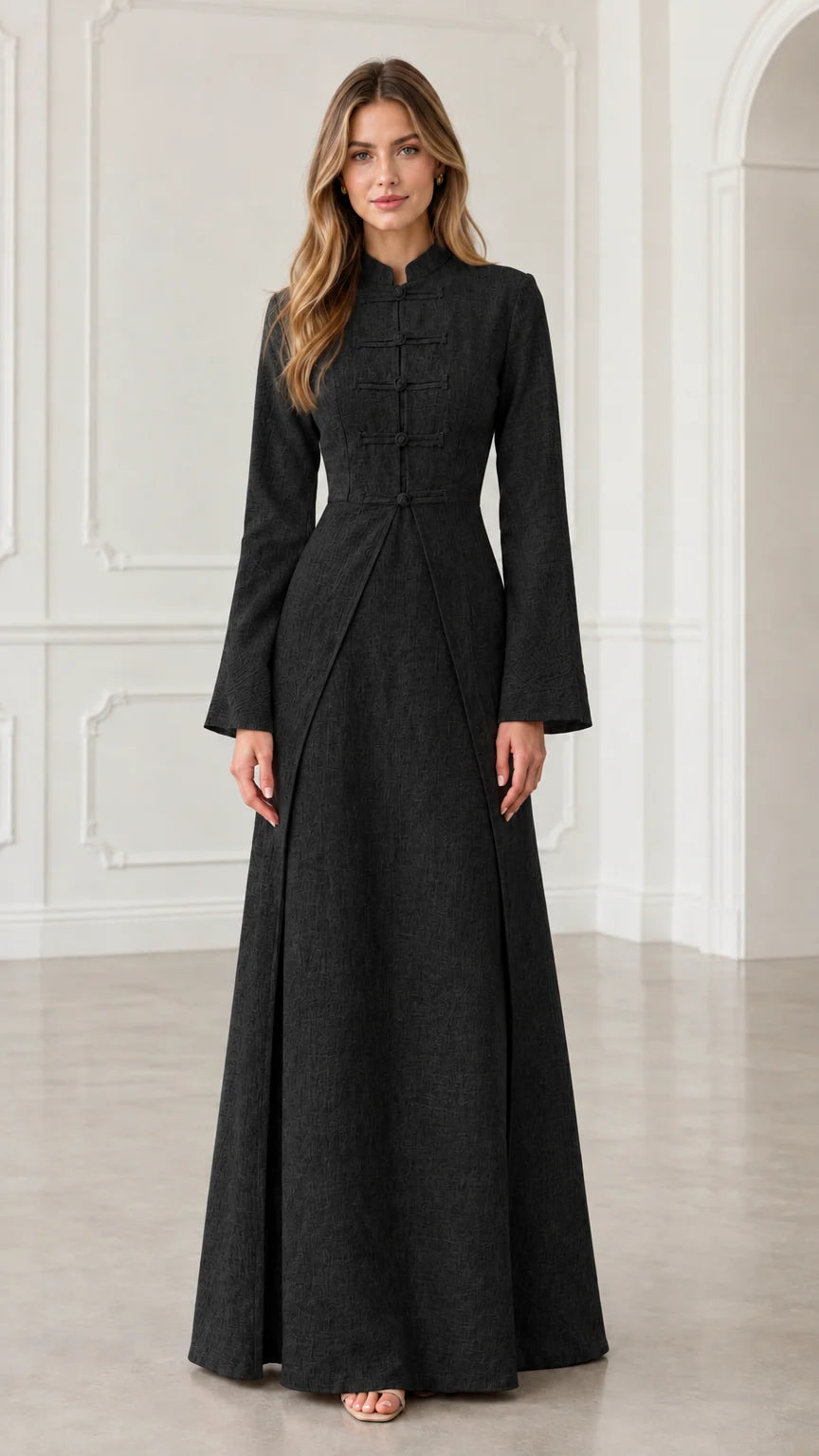 Front view of model wearing black mandarin collar long sleeve maxi dress