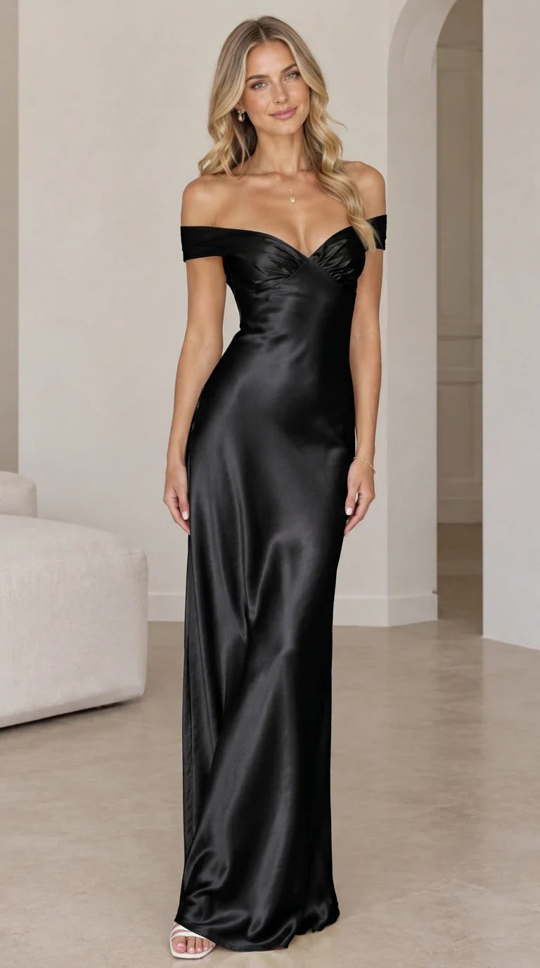 Front view of woman wearing black off-the-shoulder satin maxi gown