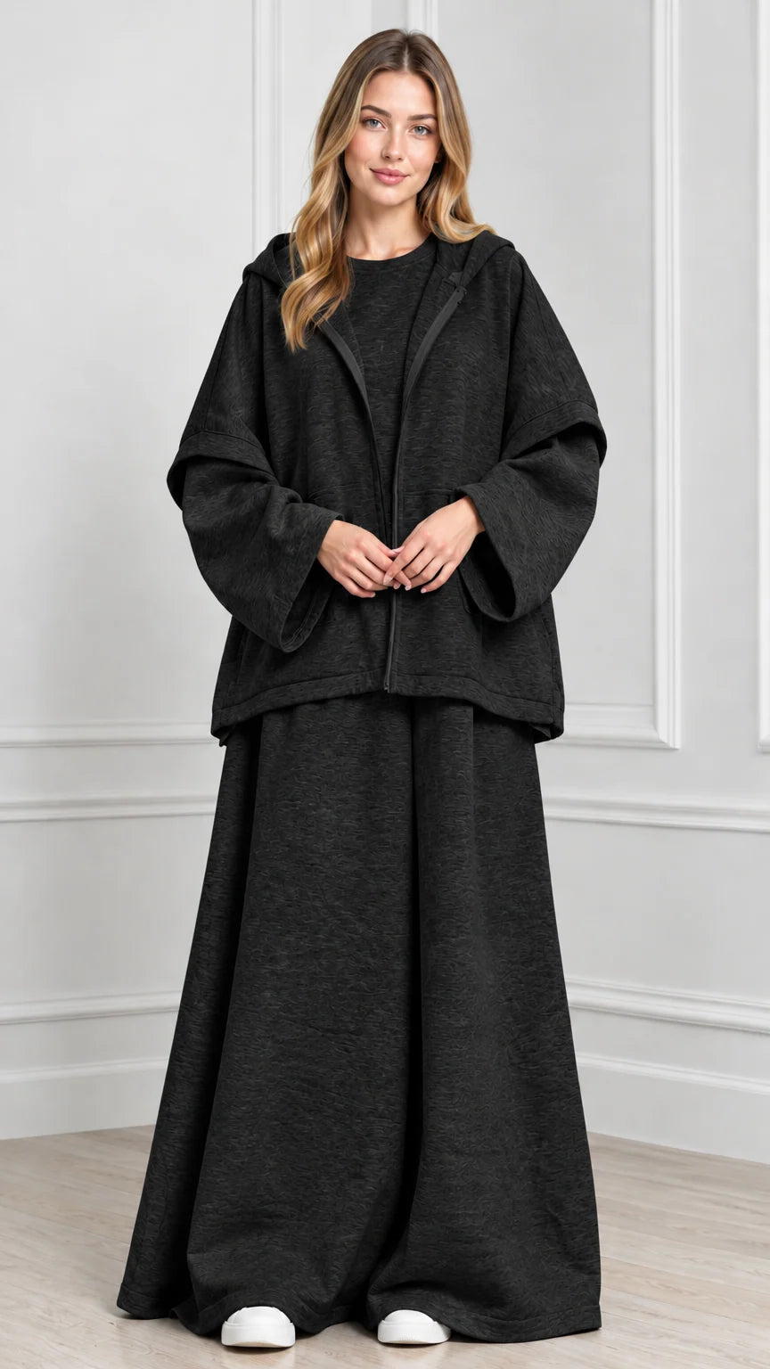 Front view of woman wearing Charcoal hooded cape jacket and wide-leg pants set