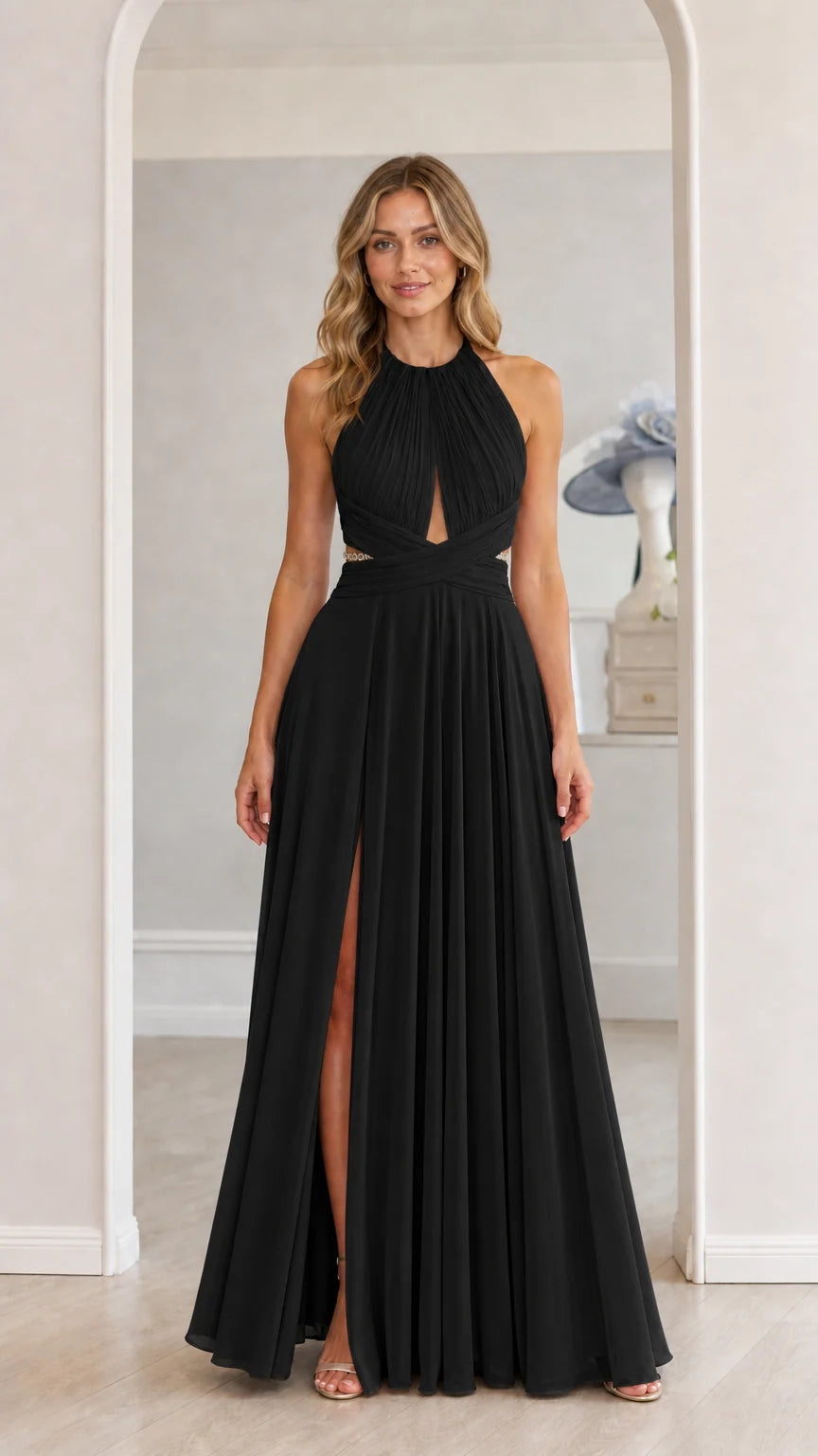 Model wearing black chiffon halter maxi dress with front slit
