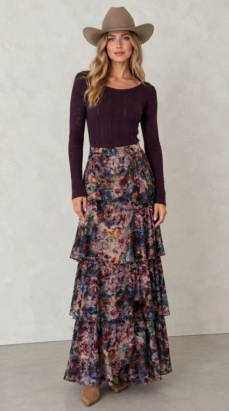 Model wearing Midnight Navy tiered floral maxi skirt with dark long sleeve top