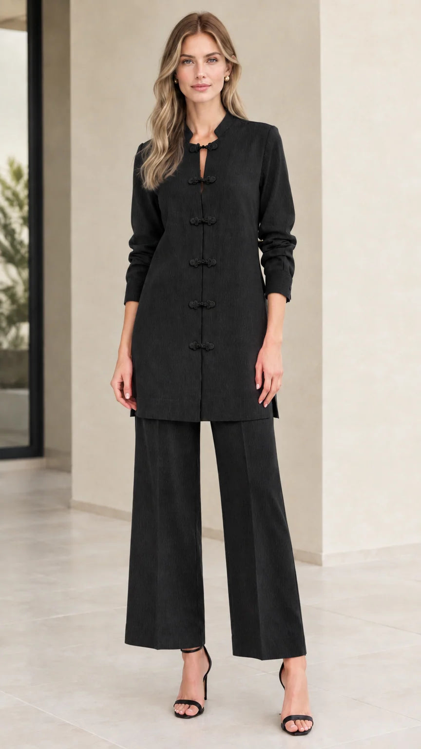 Front full-length view of woman wearing Black mandarin collar tunic and matching wide leg pants set