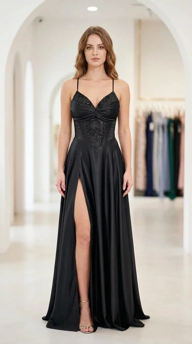 Front full-length view of black satin corset formal gown with high slit