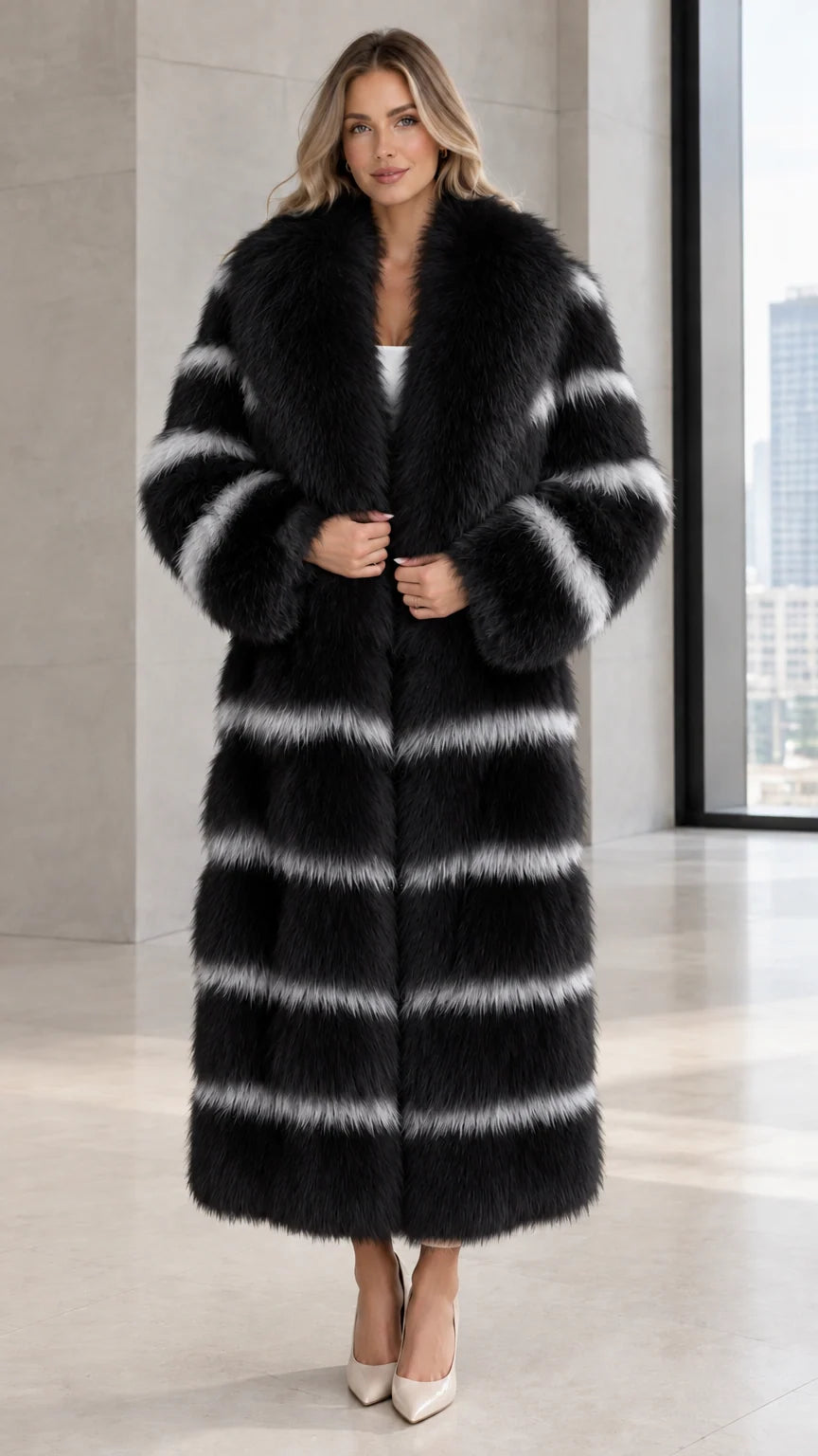 Front view of woman wearing black and white striped maxi faux fur coat