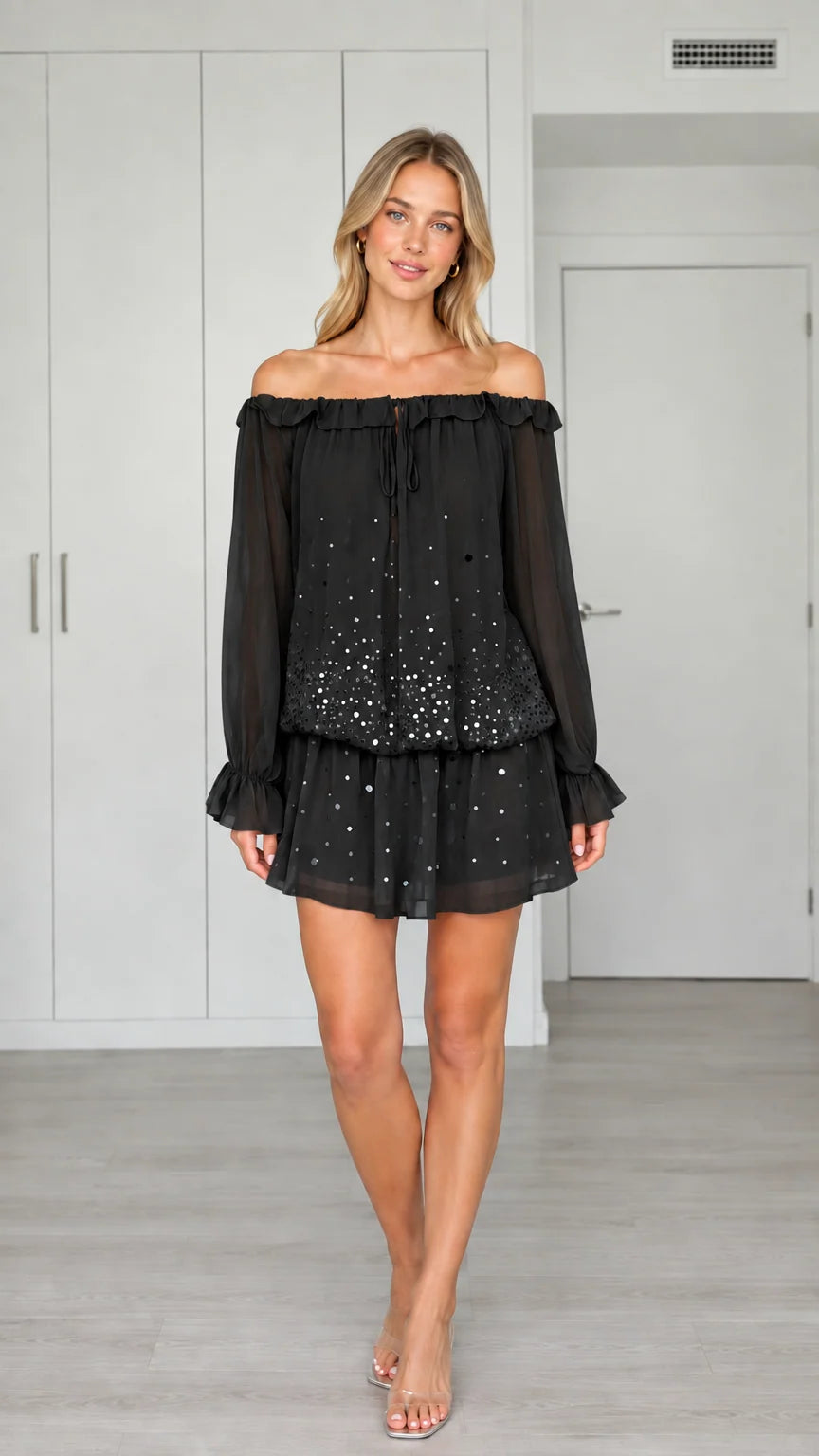 Front view of woman wearing Black off-the-shoulder sequin chiffon mini dress