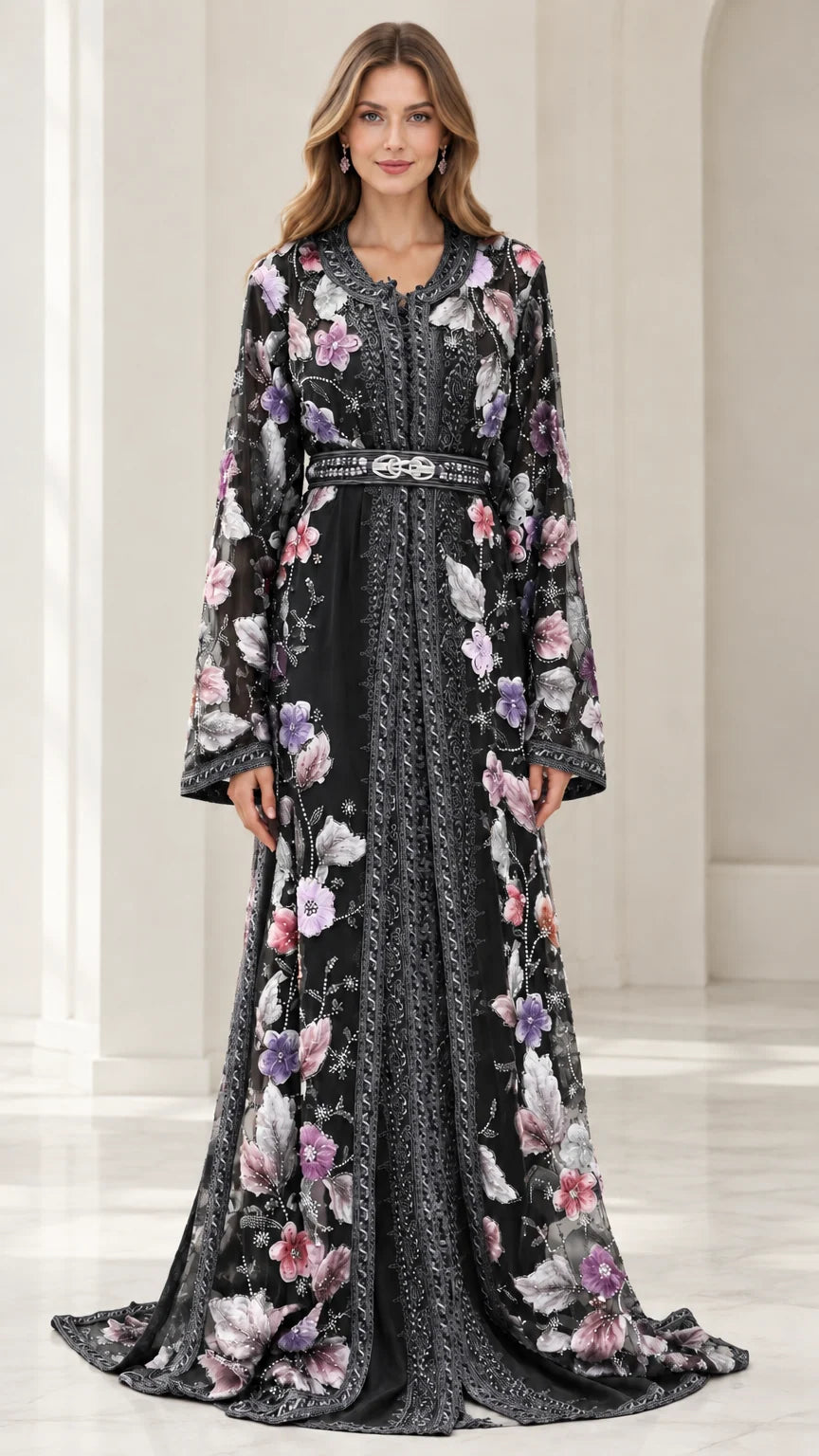 Full-length front view of black floral embroidered caftan evening dress with belt